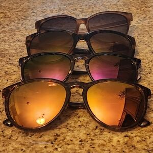 4 pairs of women's sunglasses